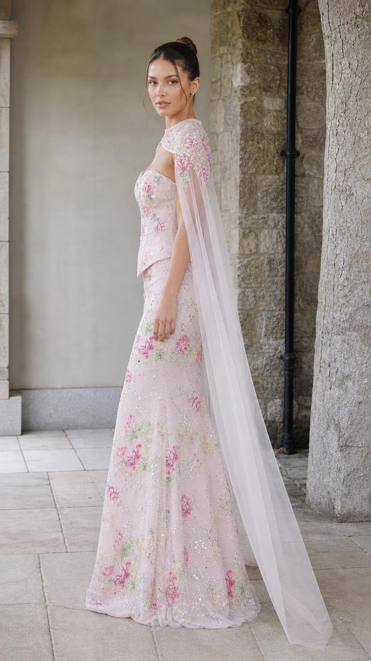Side profile view of pink floral evening gown