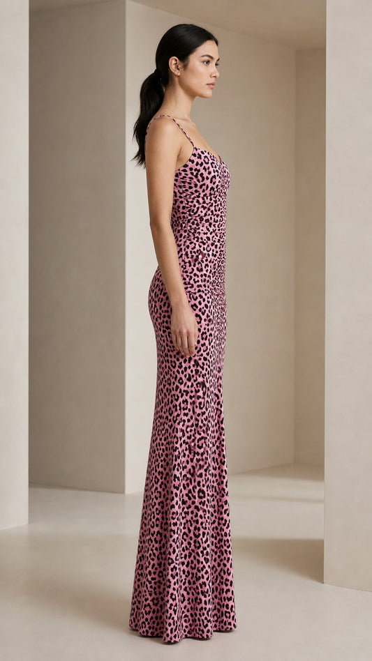 Side profile view of pink leopard print maxi dress