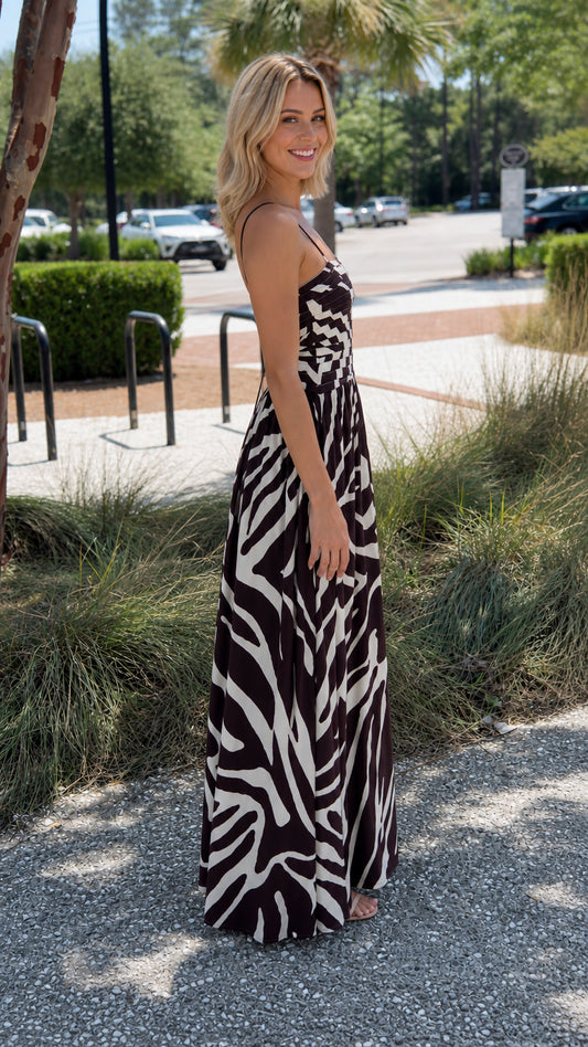 Side profile of black abstract print maxi dress
