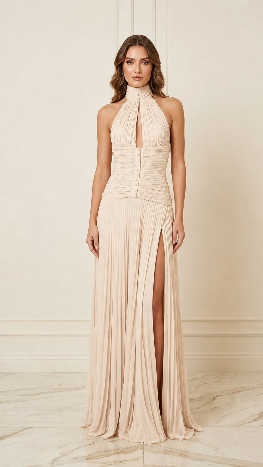 Front view of champagne pleated halter evening dress