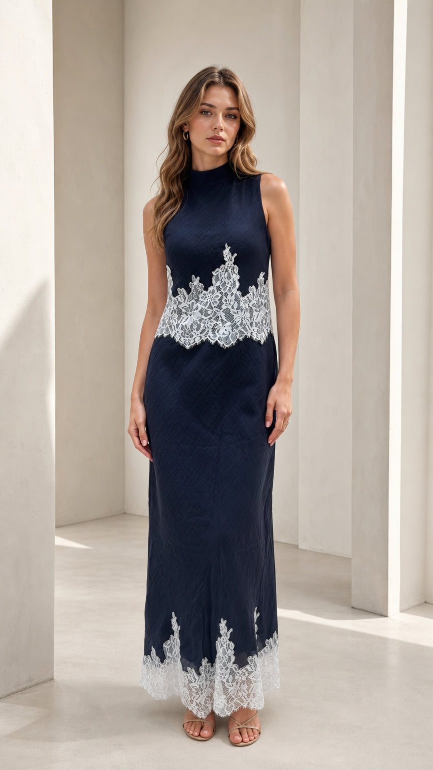 Model wearing navy mock neck lace trim maxi dress, front view