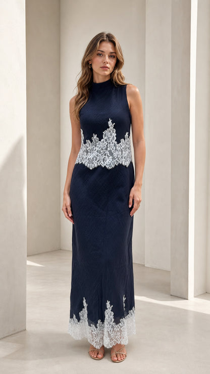 Model wearing navy mock neck lace trim maxi dress, front view