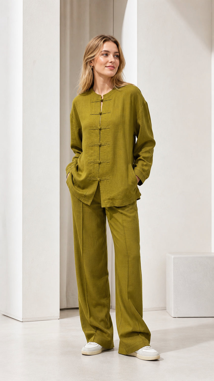Model wearing olive green linen-blend top and wide-leg pants set, front view
