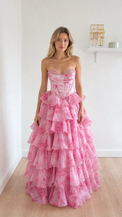 Front view of pink floral strapless corset ball gown