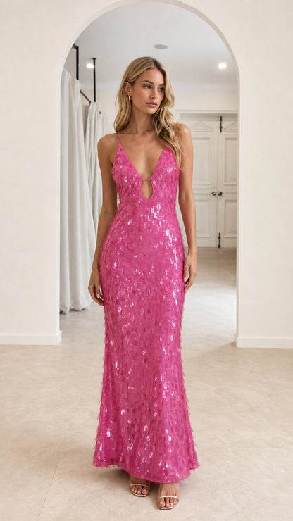 Front view of model wearing Hot Pink sequin maxi dress