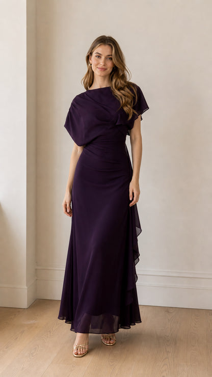 Front view of model wearing the purple chiffon capelet maxi dress