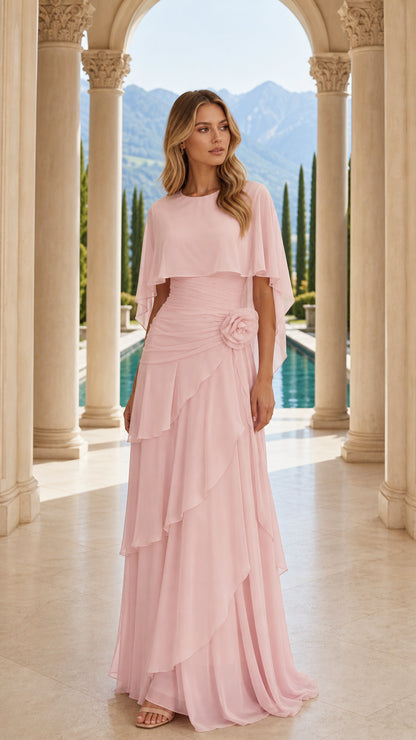 Front view of pink chiffon evening dress with cape overlay
