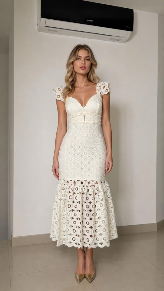 Front view of woman wearing white lace mermaid midi dress