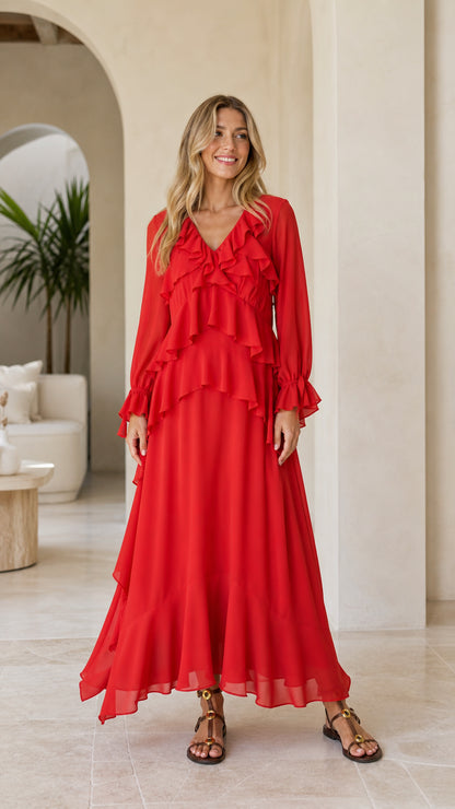 Model wearing red tiered ruffle long sleeve maxi dress front view