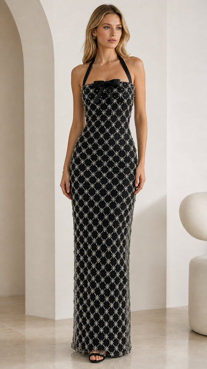 Front view of black rhinestone halter maxi dress