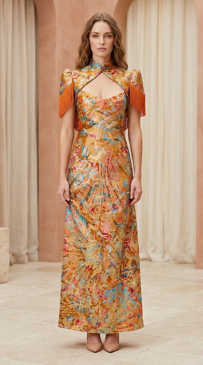 Front view of model wearing gold mandarin collar floral brocade maxi dress