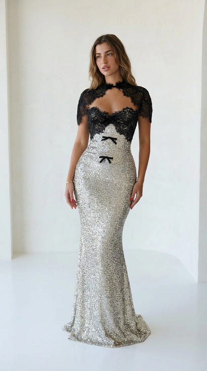 Front view of silver sequin evening gown with black lace bodice