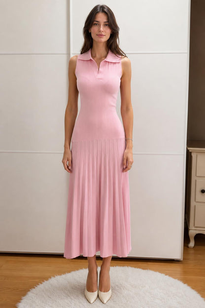 Front view of woman wearing pink sleeveless polo knit midi dress