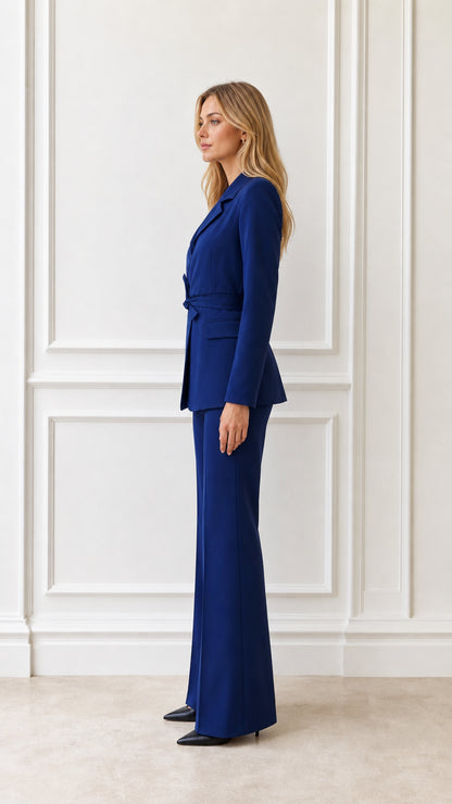 Side profile of woman in royal blue two-piece pantsuit