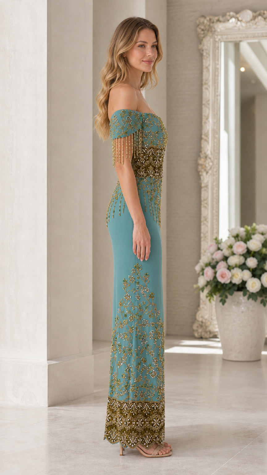 Side profile view of teal beaded evening gown