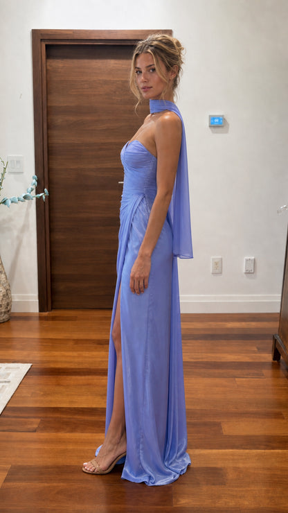 Lavender halter evening maxi dress shown from the side with flowing scarf detail