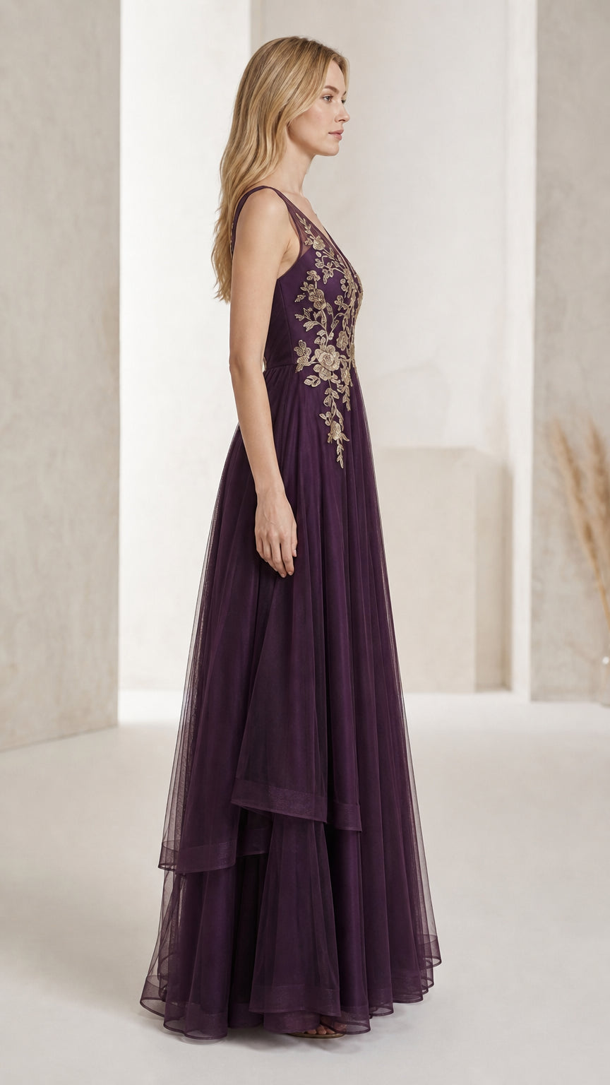Side profile of purple layered tulle formal dress