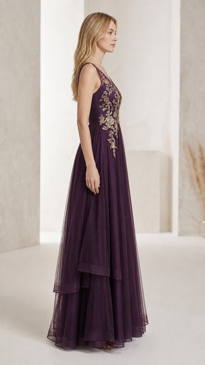 Side profile of purple layered tulle formal dress