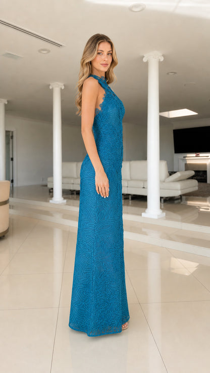 Side profile view of blue embroidered maxi dress