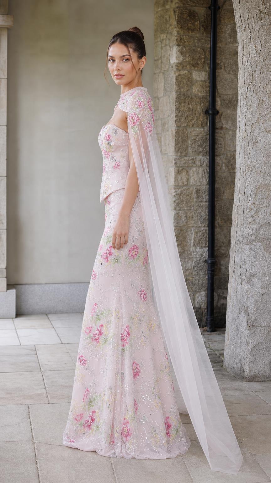 Side profile view of pink floral evening gown