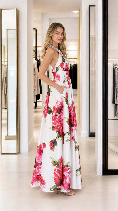 Side profile view of white floral maxi dress with pockets
