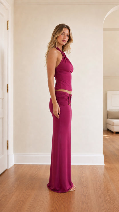 Side profile of model in fuchsia two-piece set