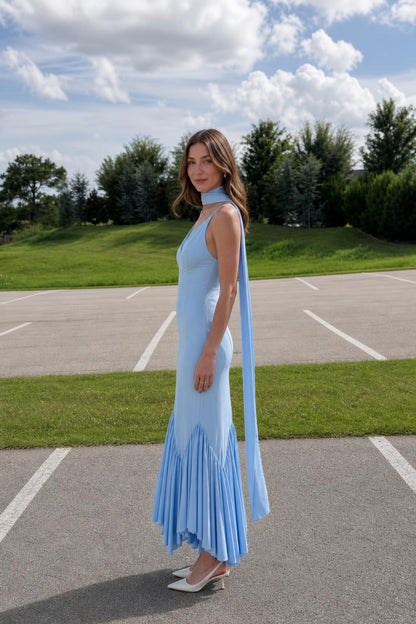 Side profile of light blue maxi dress outdoors