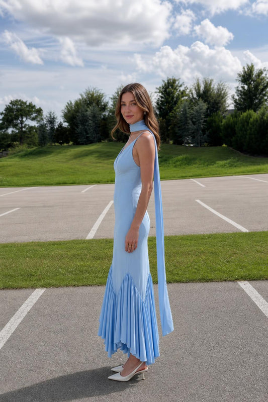 Side profile of light blue maxi dress outdoors