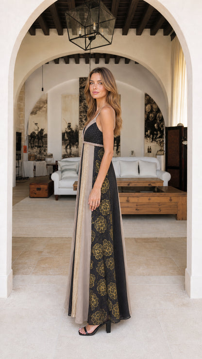 Side profile of model in black boho maxi dress