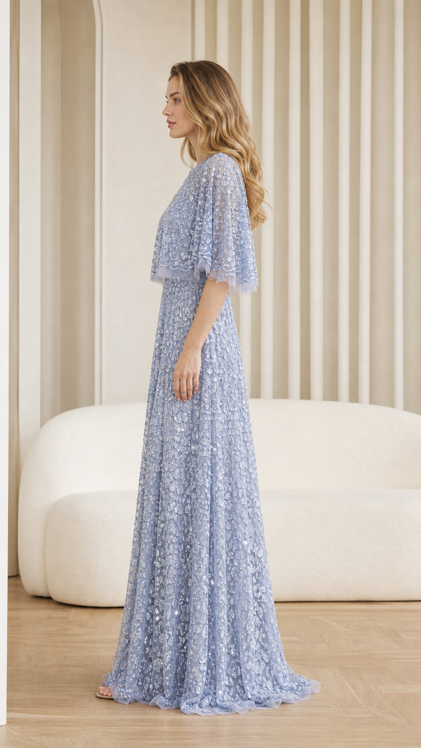 Side profile of light blue sequin maxi dress