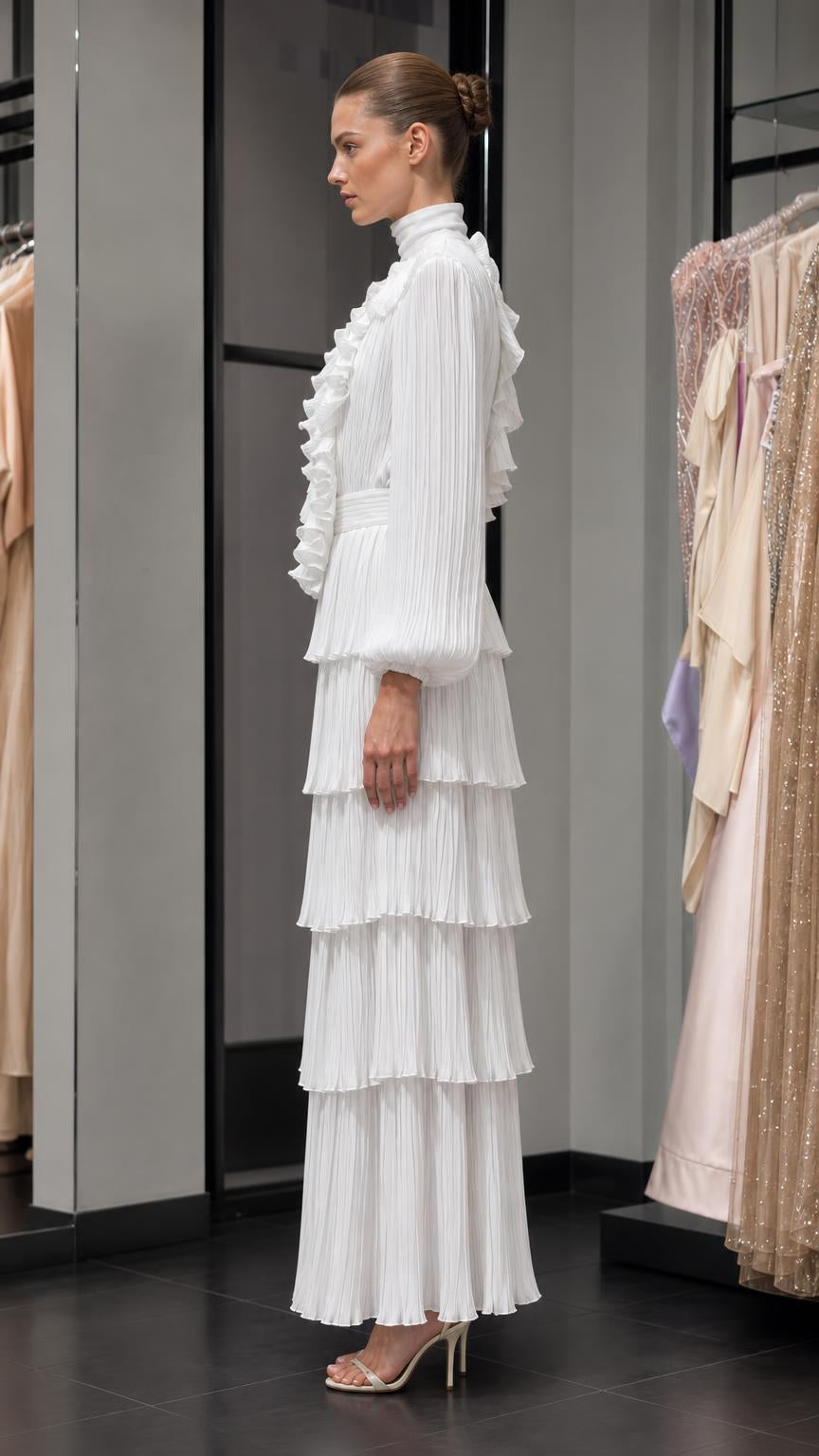 Side profile of white tiered maxi dress with long sleeves