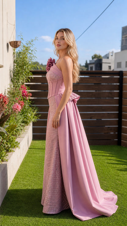 Side profile of pink evening gown on outdoor patio
