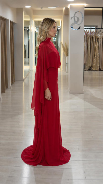 Side profile view of red cape evening gown