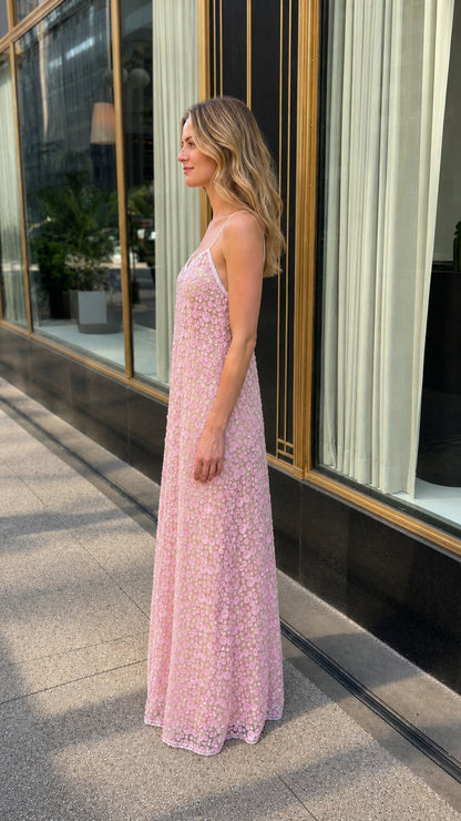 Side profile view of pink maxi dress