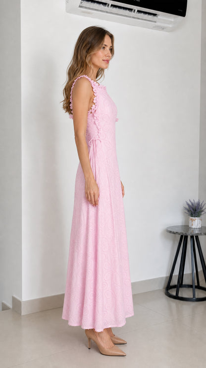 Side profile of model wearing pink eyelet maxi dress