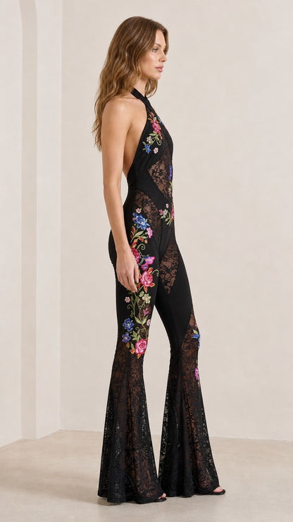 Side profile view of black embroidered lace jumpsuit