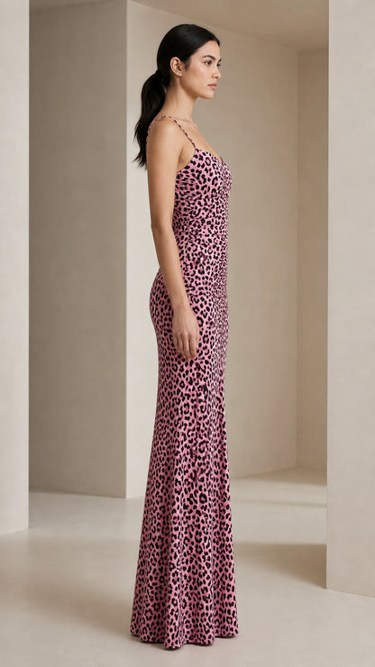 Side profile view of pink leopard print maxi dress