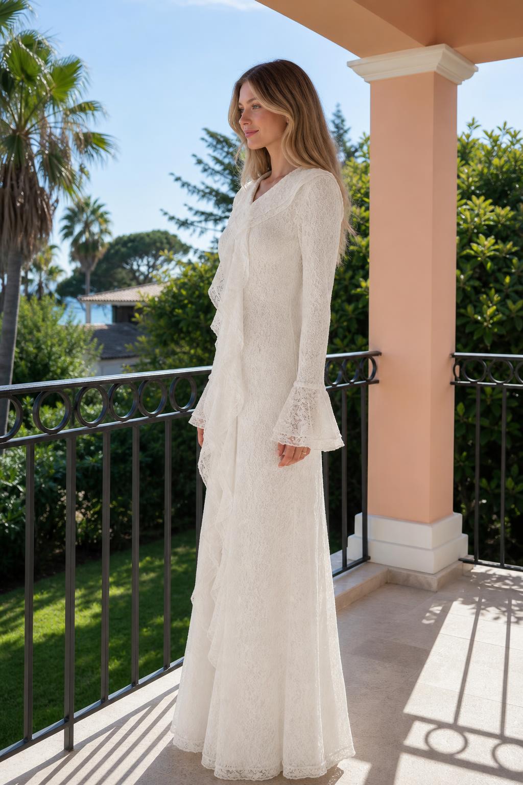 Side profile of woman wearing white long sleeve lace maxi dress