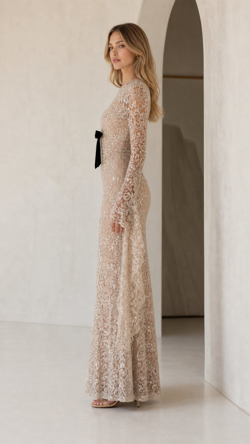 Side profile view of champagne evening gown