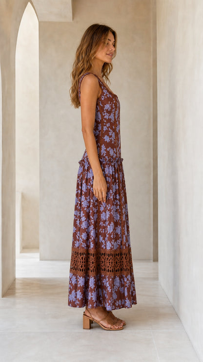 Side profile view of brown floral maxi dress
