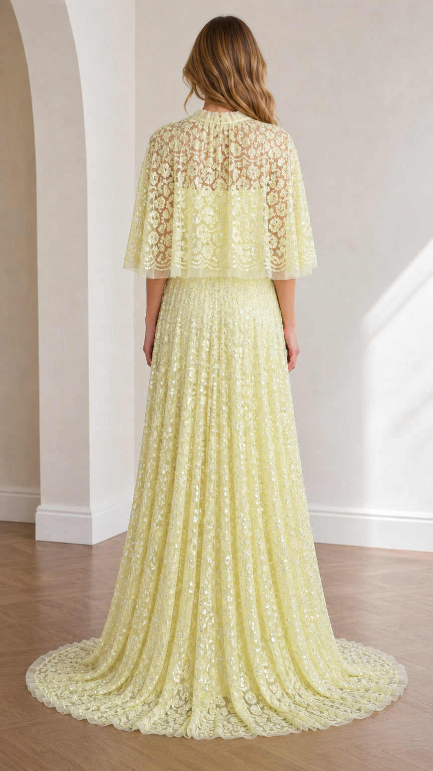 Back view of yellow evening gown with train