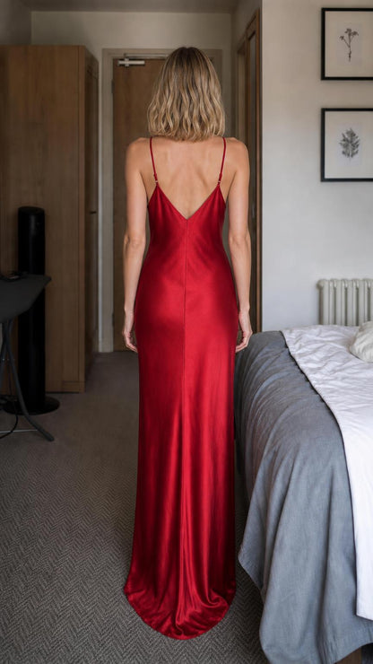 Red satin-look slip dress shown from the back with a low V-back and slim straps