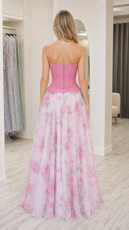 Model wearing pink strapless floral corset long dress back view