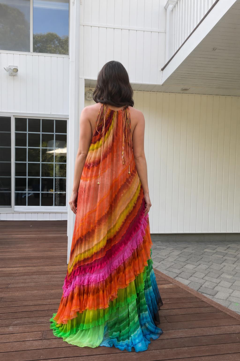 Back view showcasing halter neck ties on sunset rainbow maxi dress