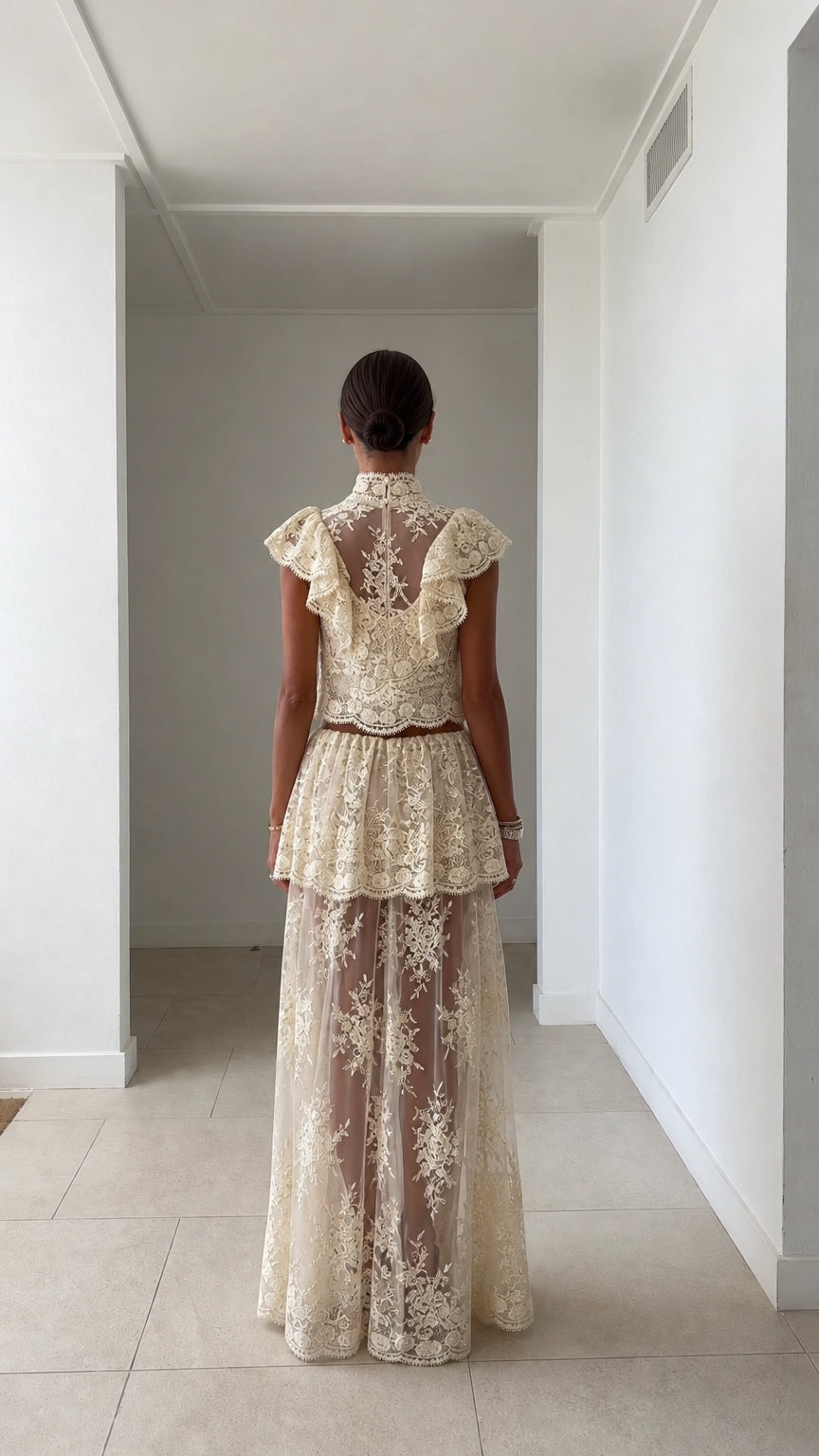 Back view of model in ivory lace two-piece set