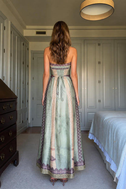 Back view of model in Sage Green maxi dress