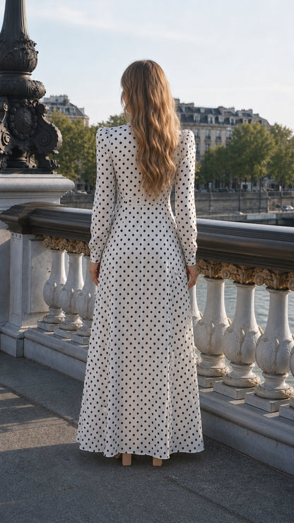 Back view of white polka dot long sleeve maxi dress