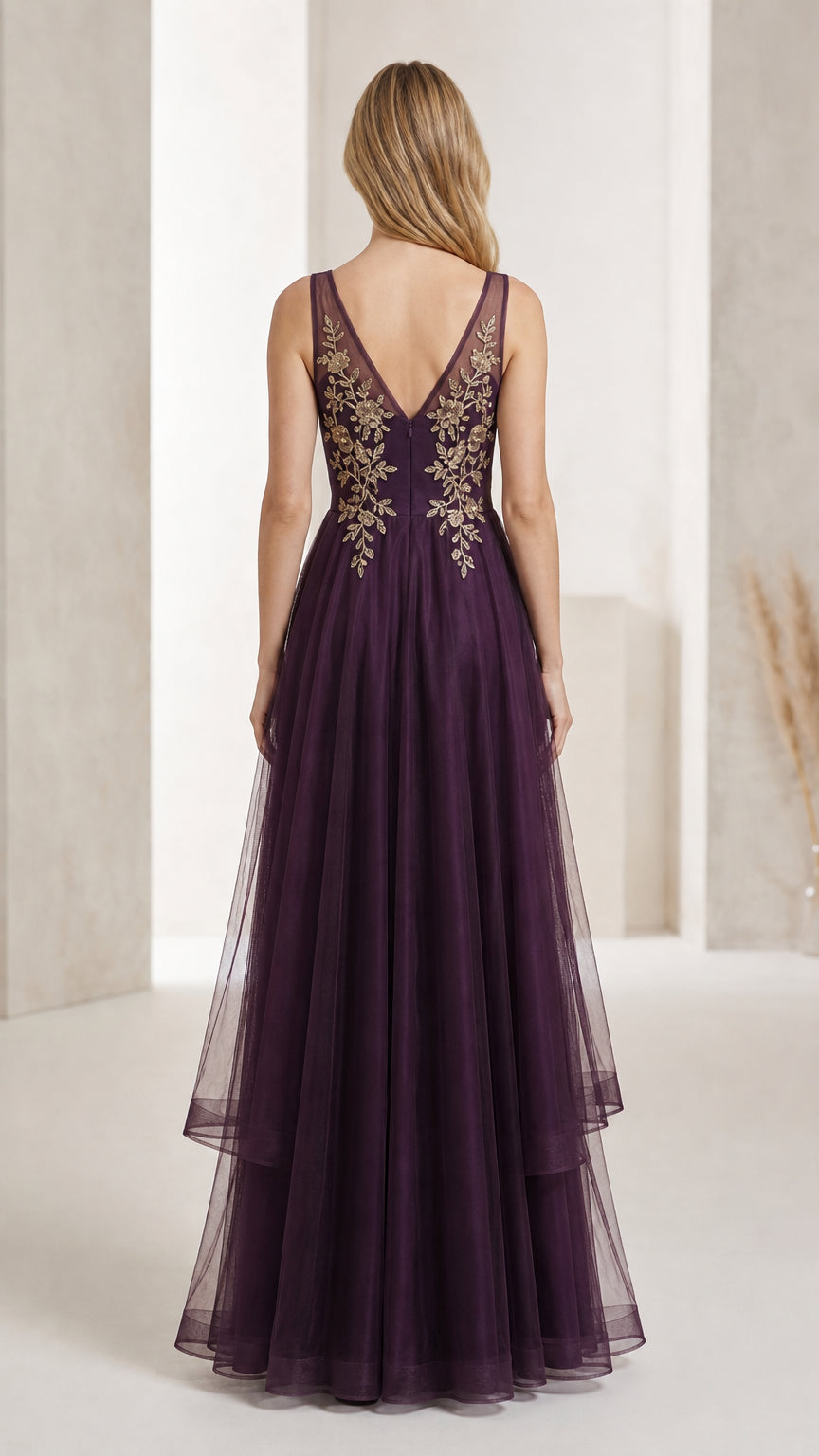 Back view showing V-back design of purple gown