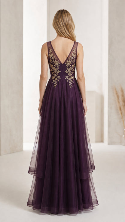 Back view showing V-back design of purple gown