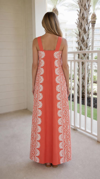 Back view of woman wearing coral maxi dress